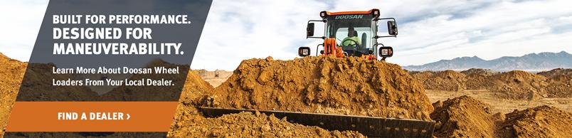 Doosan DL250-5 Wheel Loader moves a pile of soil.