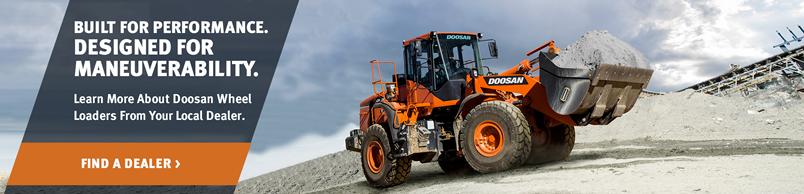 Doosan DL350-5 Wheel Loader hauls soil on a construction jobsite.