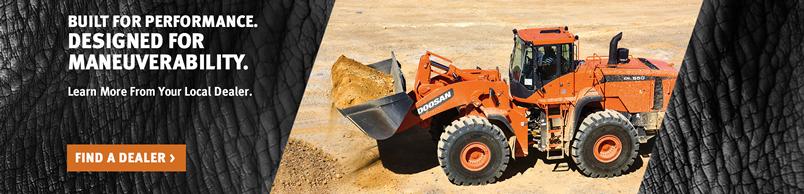 Doosan DL550-5 Wheel Loader hauls a pile of dirt with a bucket attachment.